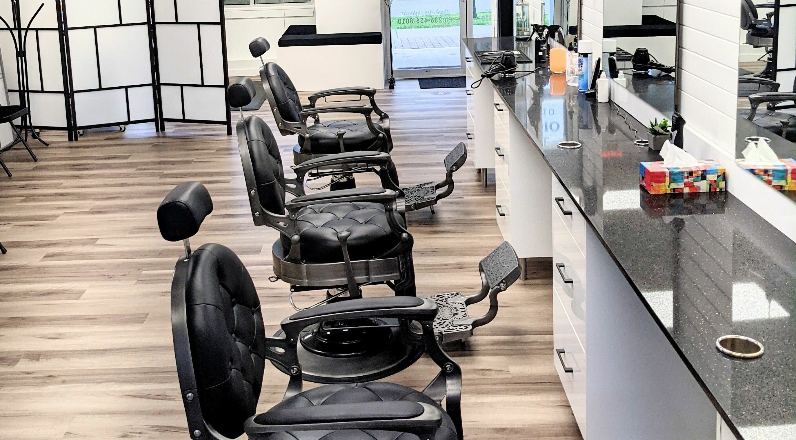 Elegant barber chairs and modern design at Royal Fade and Hair Studio, Surrey, British Columbia, CA.