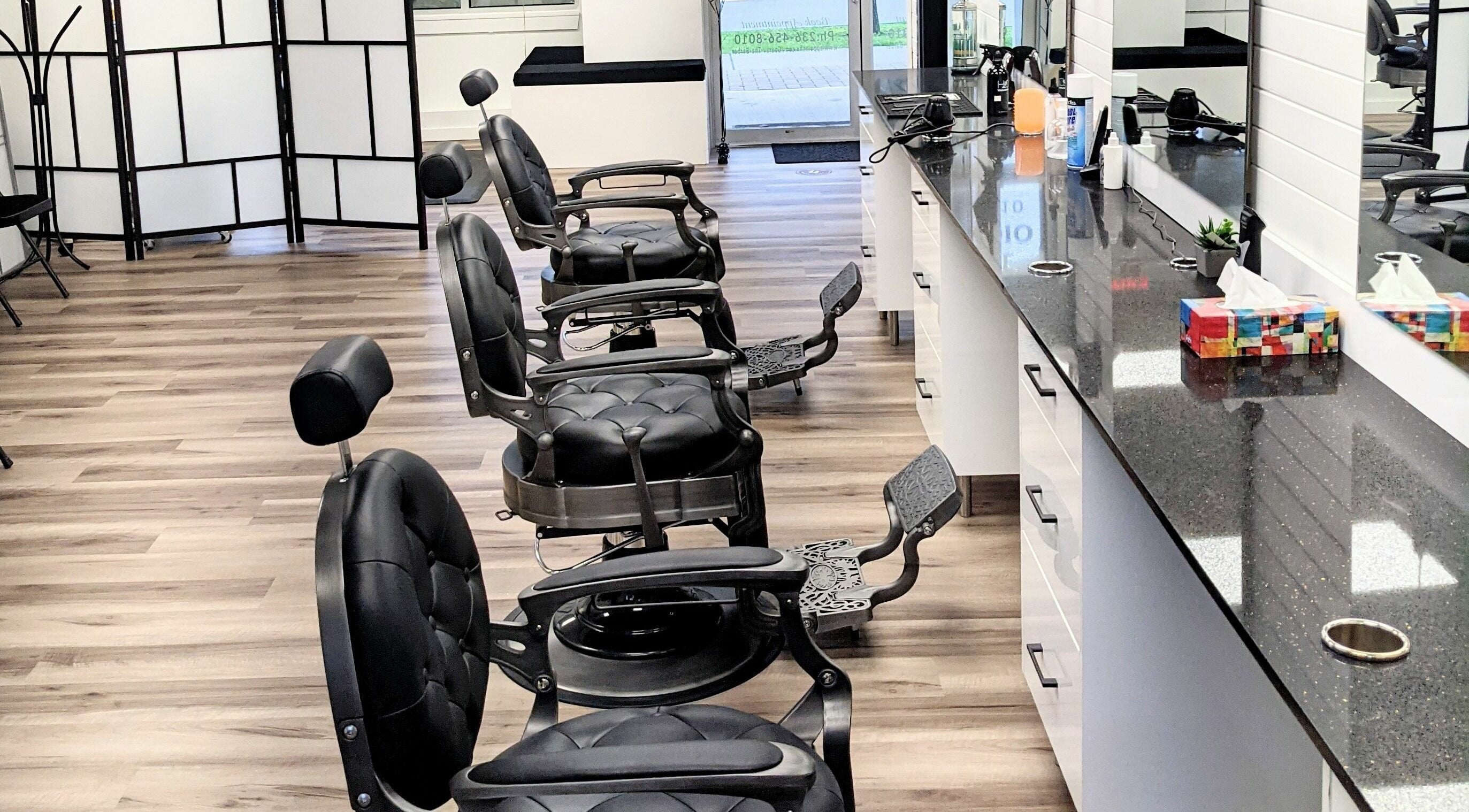 Elegant barber chairs and modern design at Royal Fade and Hair Studio, Surrey, British Columbia, CA.