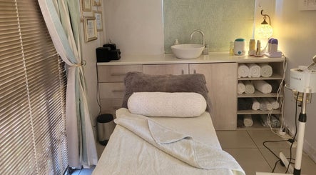 Relaxing treatment room at Belle Femme Waxing Specialist, Cape Town, Western Cape, ZA with soft lighting and cozy decor.