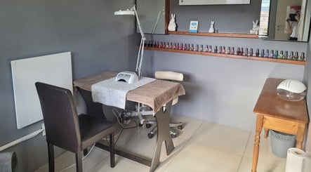 Cozy nail table at Belle Femme Waxing Specialist in Cape Town, Western Cape, ZA, showcasing nail polish variety.