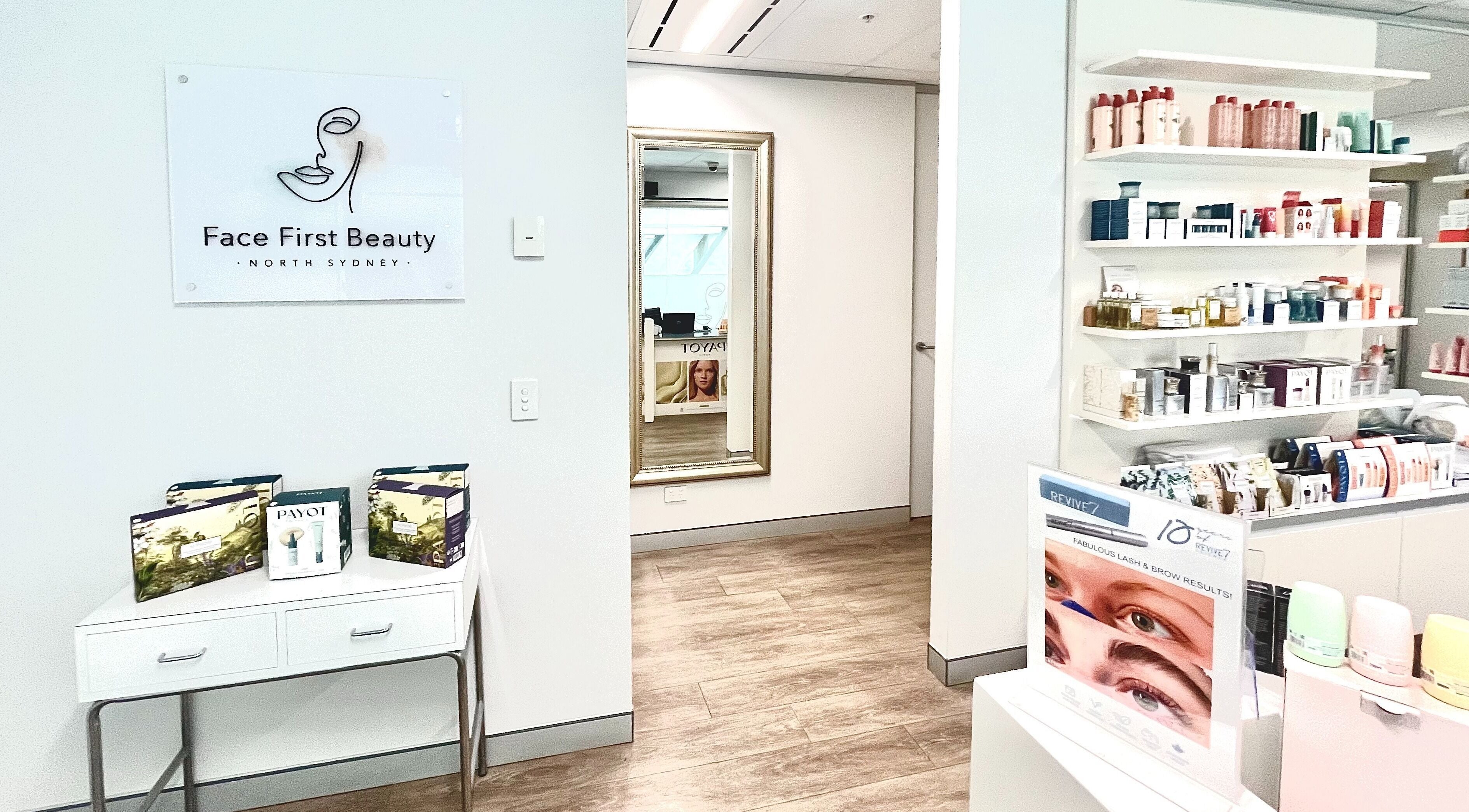 Interior of Face First Beauty North Sydney with product displays, North Sydney, New South Wales, AU.