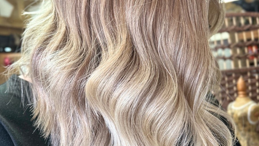 Blonde waves hairstyle at JADE Hair, Congleton, England, GB enhancing natural elegance and shine.