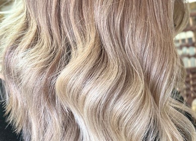 Blonde waves hairstyle at JADE Hair, Congleton, England, GB enhancing natural elegance and shine.