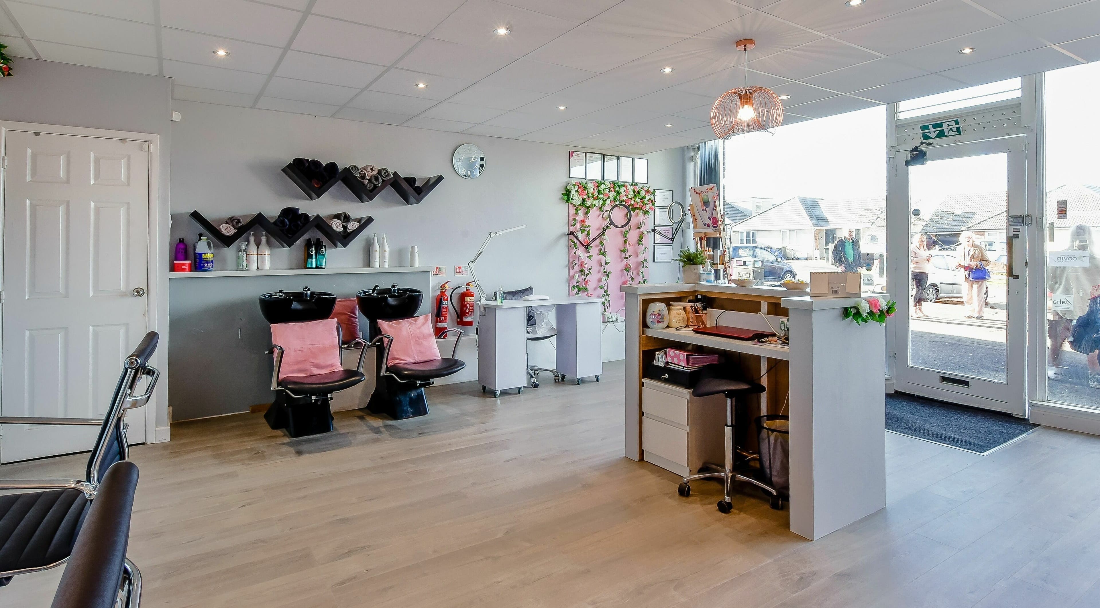 Modern salon interior at Diverse Hair Design in Waterlooville, England, GB with stylish decor and relaxing atmosphere.