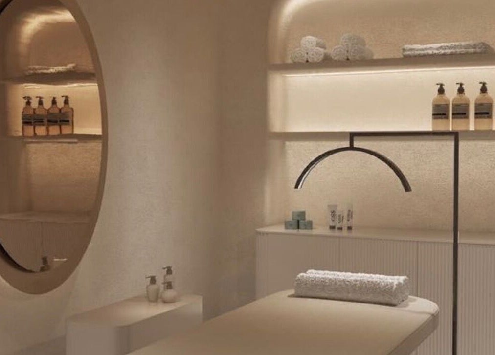 Luxurious treatment room at D Beauty Bar, Naxxar, MT, featuring modern decor and ambient lighting.