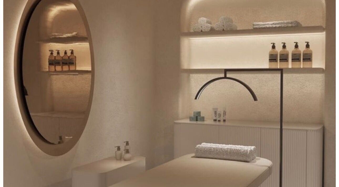 Luxurious treatment room at D Beauty Bar, Naxxar, MT, featuring modern decor and ambient lighting.