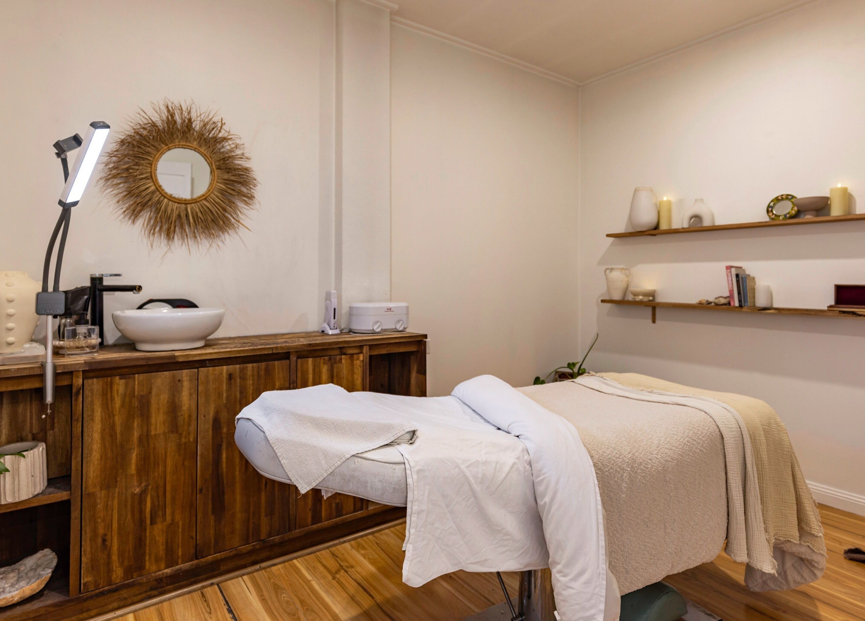 Relaxing treatment room at Tranquility Skin & Body, Emu Plains, New South Wales, AU featuring a massage bed.