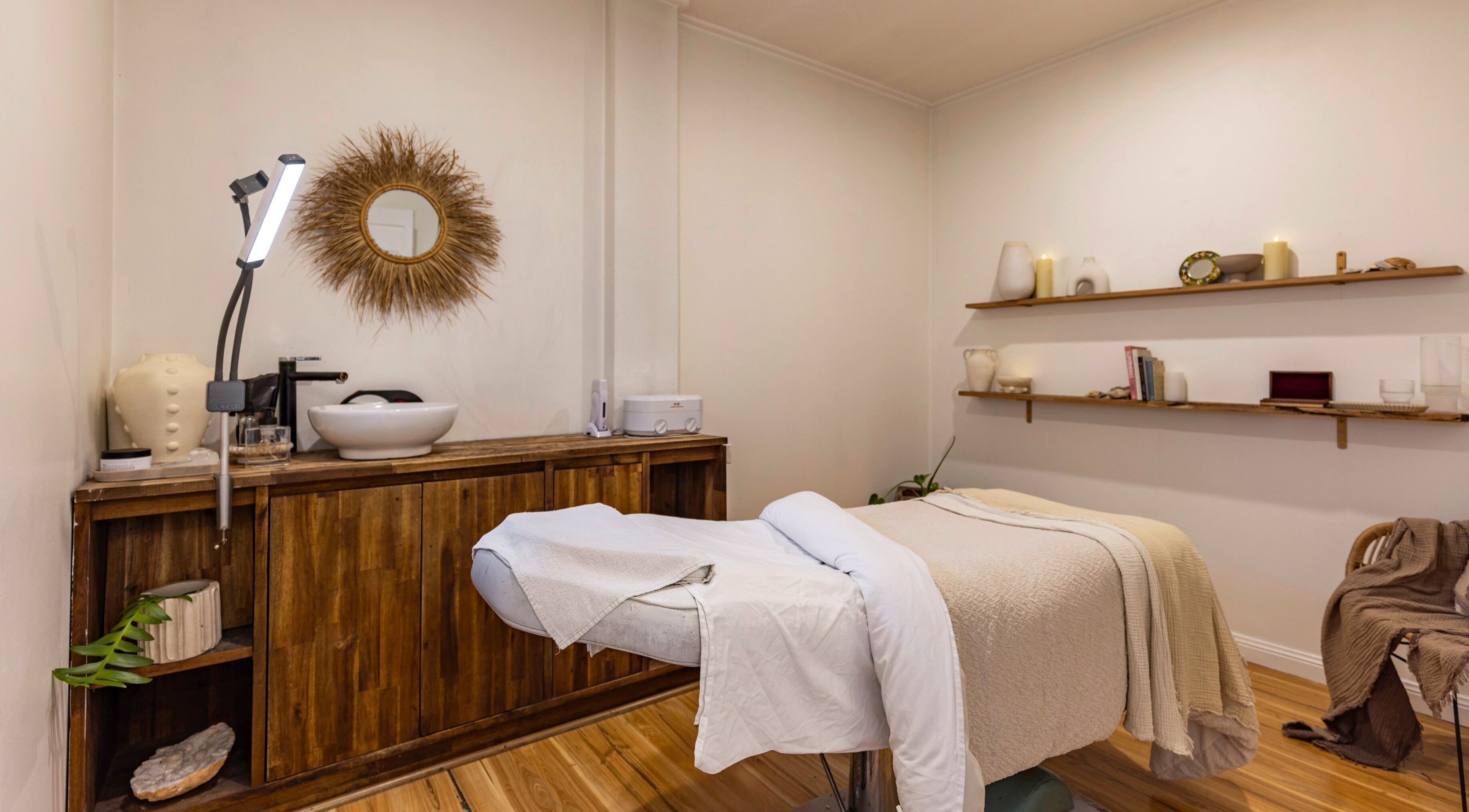 Relaxing treatment room at Tranquility Skin & Body, Emu Plains, New South Wales, AU featuring a massage bed.