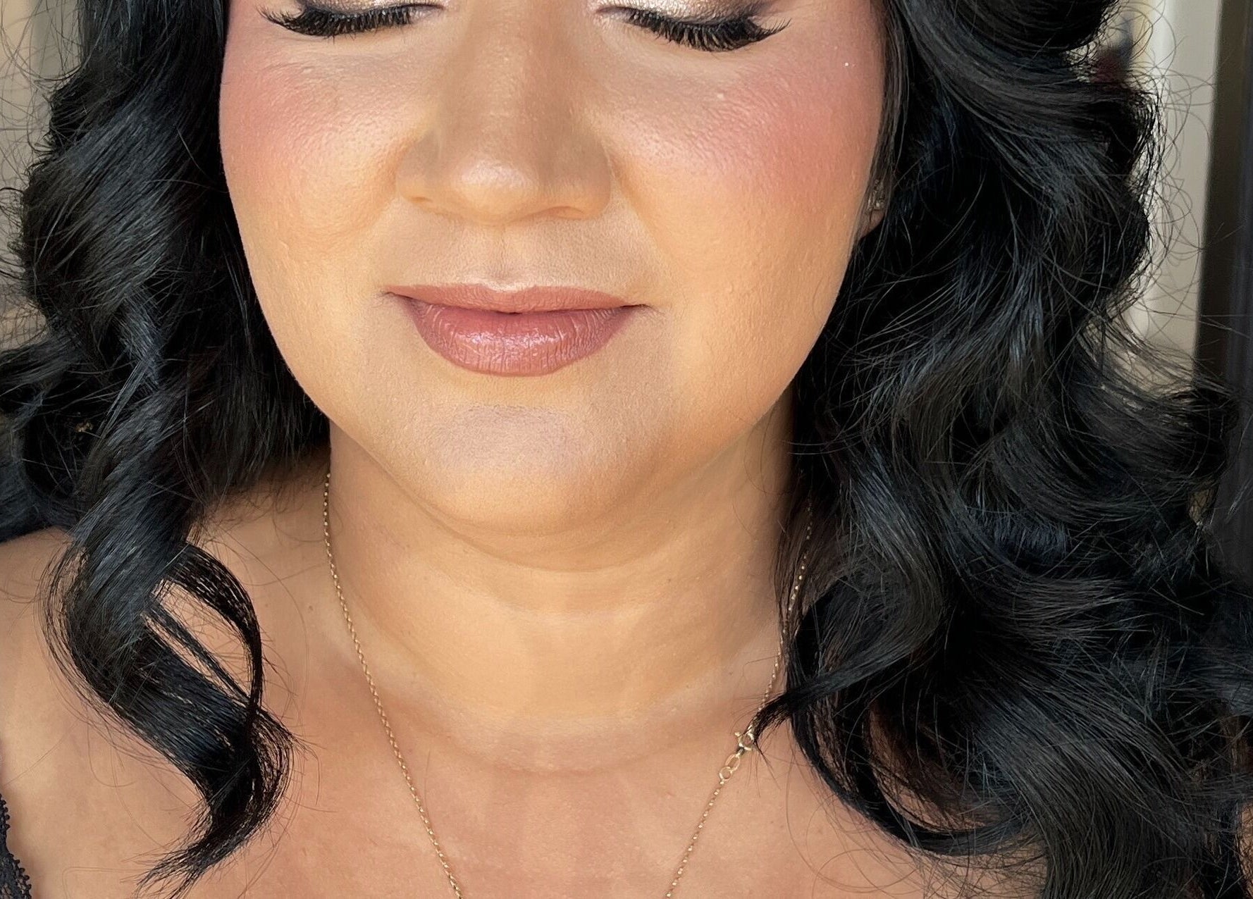 Elegant hairstyle and makeup by Shantelle Barry Hair & Makeup in Gordonvale, Queensland, AU.