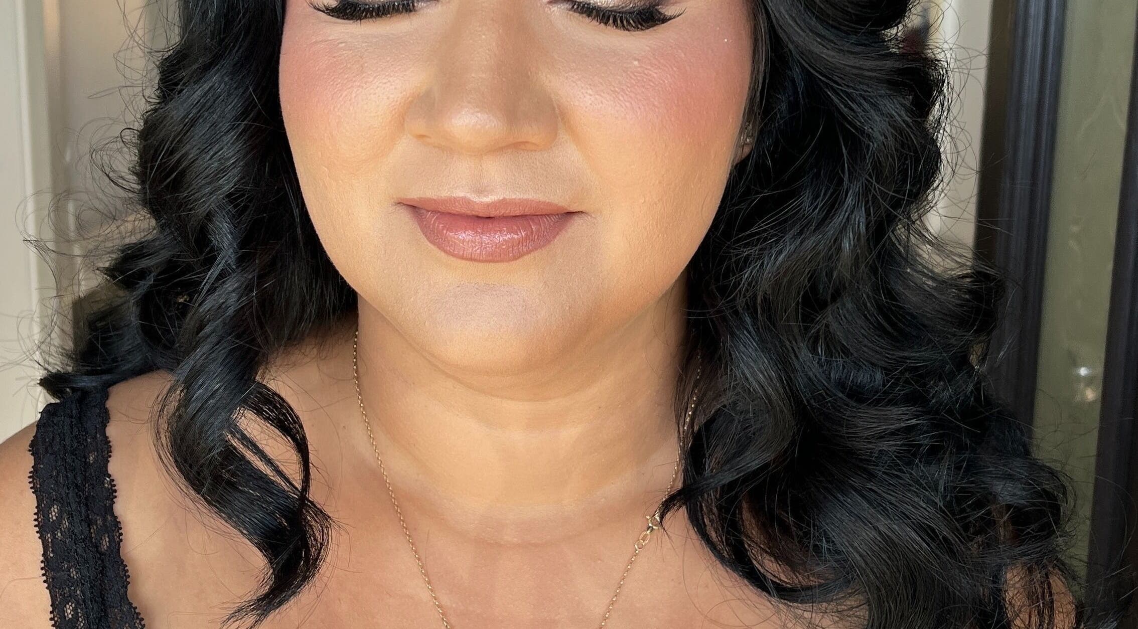 Elegant hairstyle and makeup by Shantelle Barry Hair & Makeup in Gordonvale, Queensland, AU.