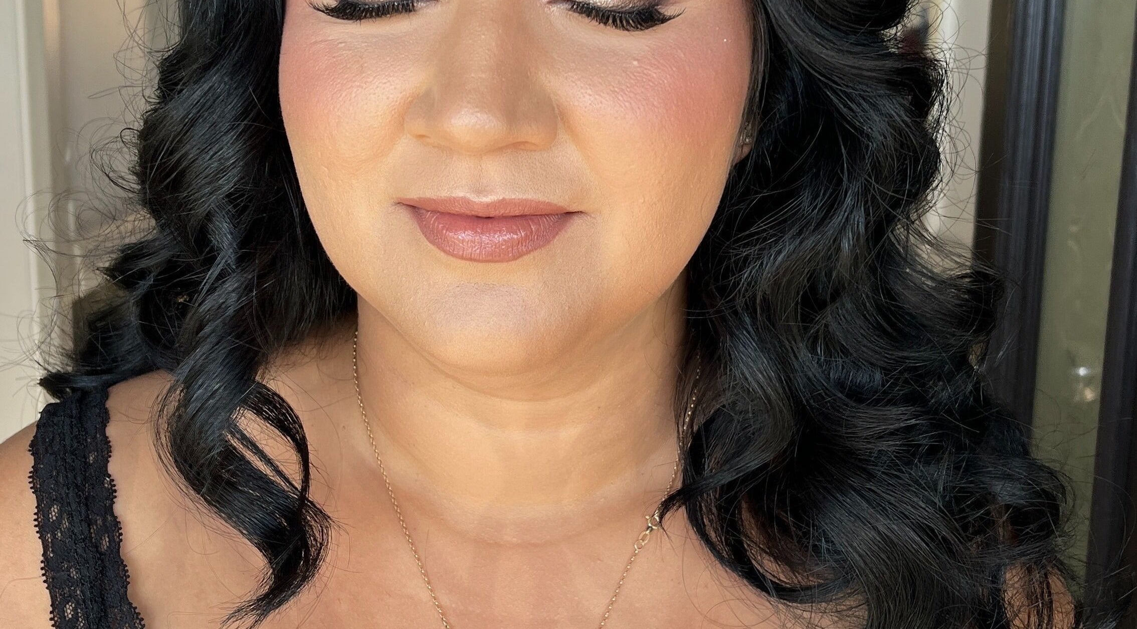 Elegant hairstyle and makeup by Shantelle Barry Hair & Makeup in Gordonvale, Queensland, AU.