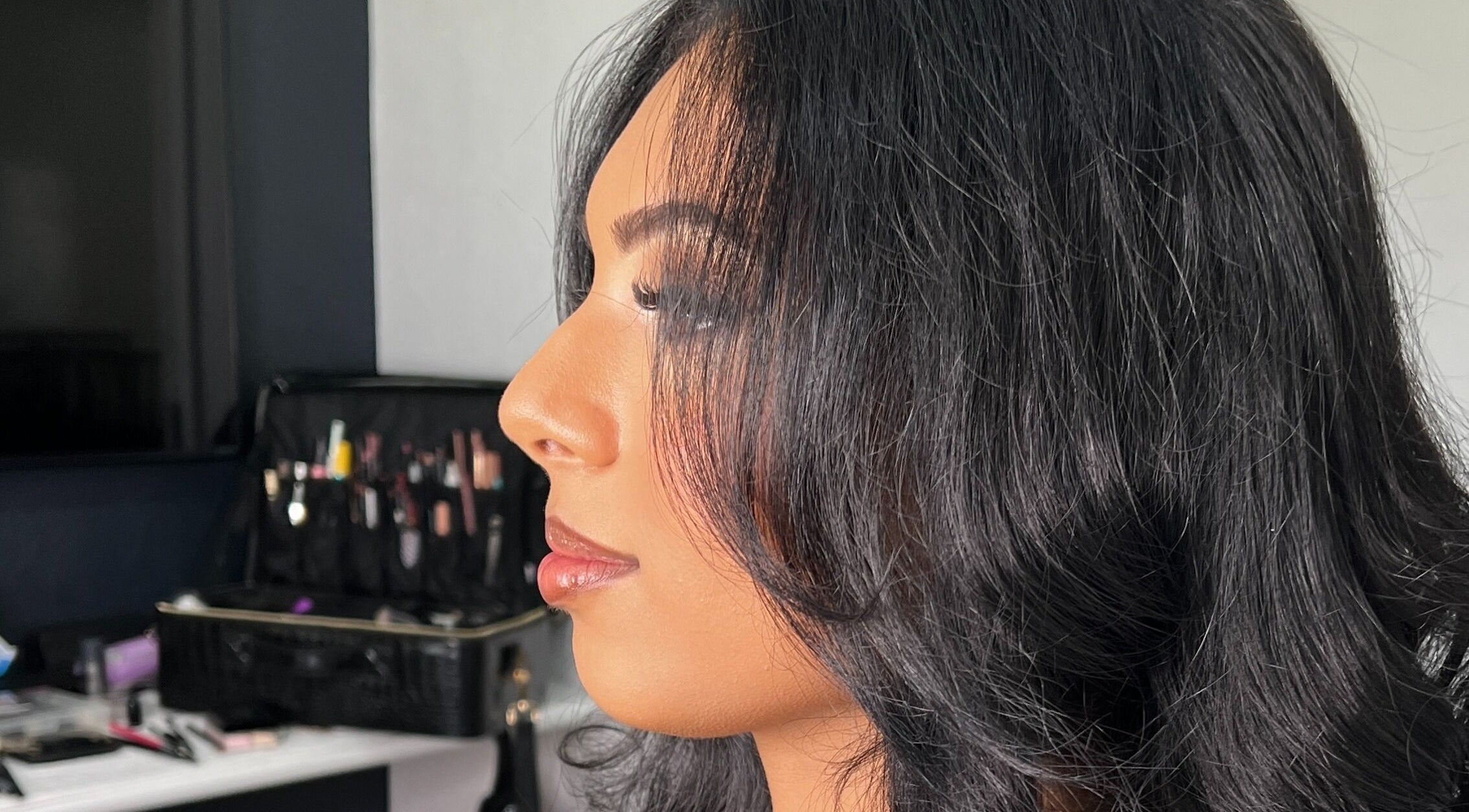Profile of a woman with styled hair at Shantelle Barry Hair & Makeup, Gordonvale, Queensland, AU.