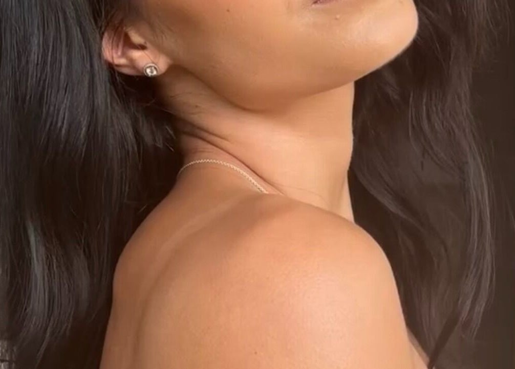 Glamorous woman with elegant hairstyle at Shantelle Barry Hair & Makeup, Gordonvale, Queensland, AU.