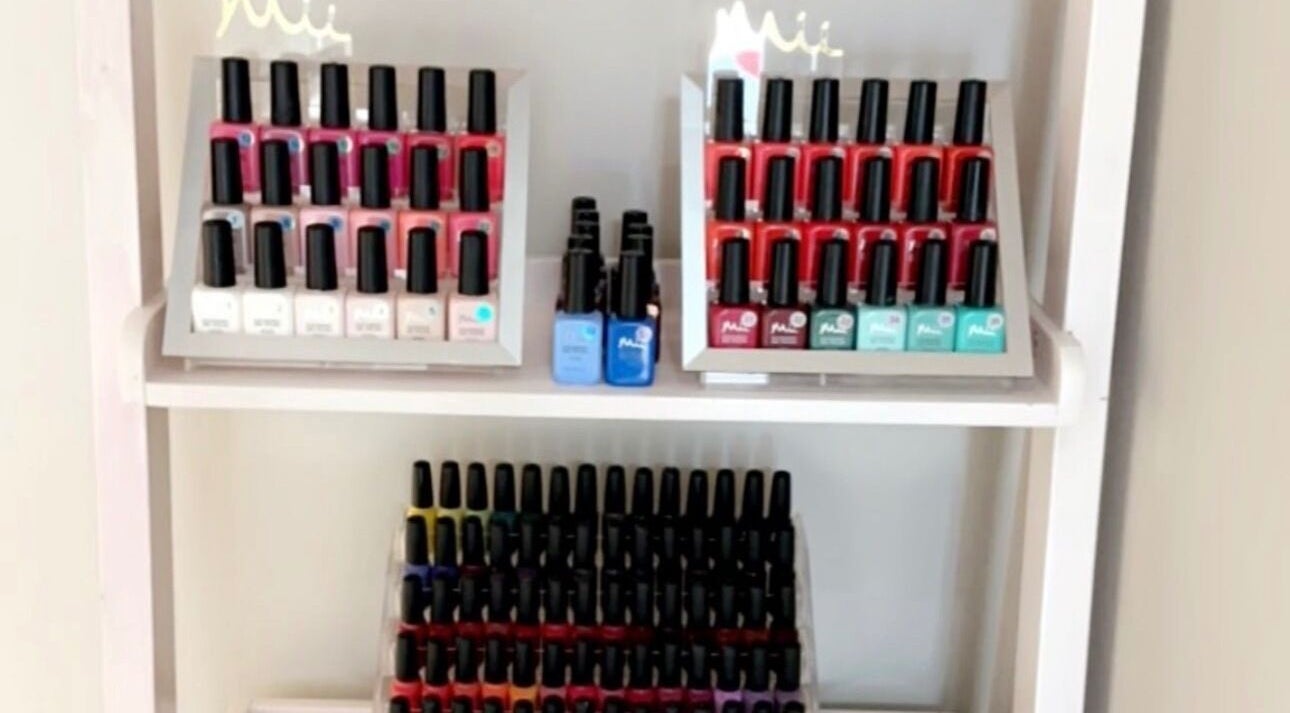 Nail polishes array at Blossom Health and Beauty, Great Shelford, England, GB.