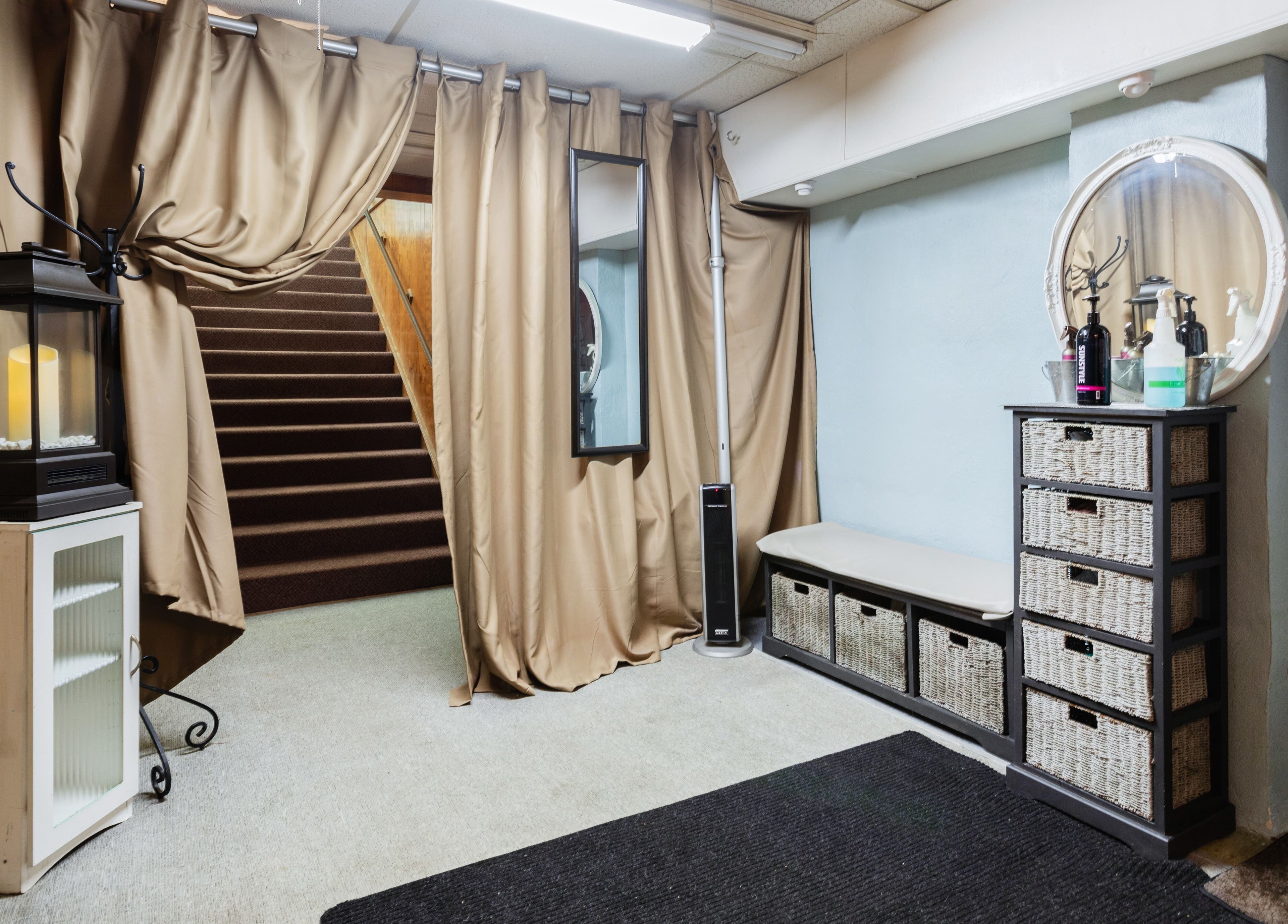 Entrance of Bare Beauty Aesthetics in Ludlow, Massachusetts, featuring elegant decor and a warm ambiance.