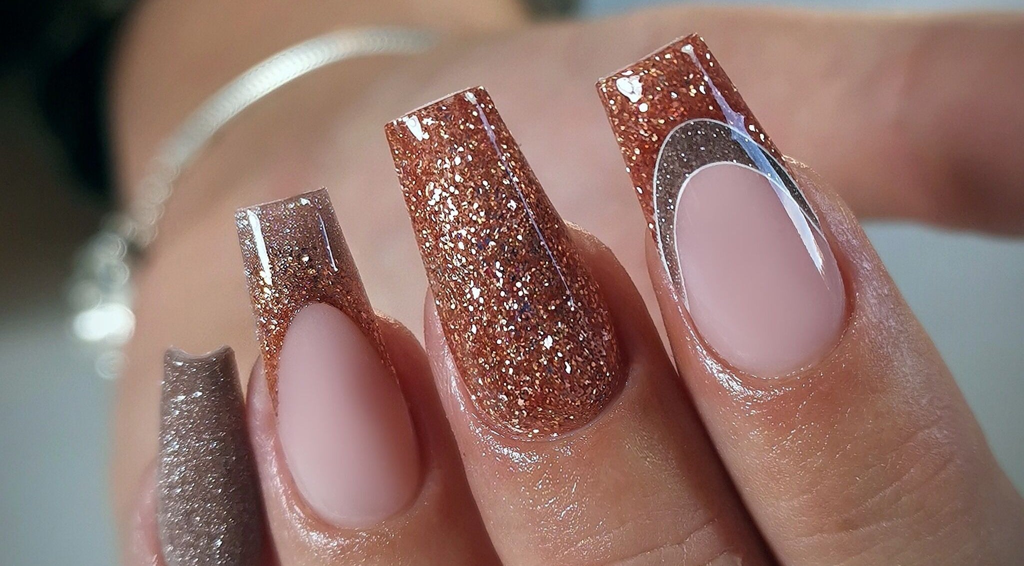 Sparkly nails by Kerry Wright Nail Artist in Rotherham, England, GB, showcasing intricate glitter design.