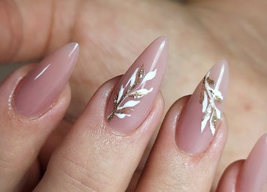 Elegant nail art by Kerry Wright Nail Artist, Rotherham, England, GB. Features intricate design on nude base.
