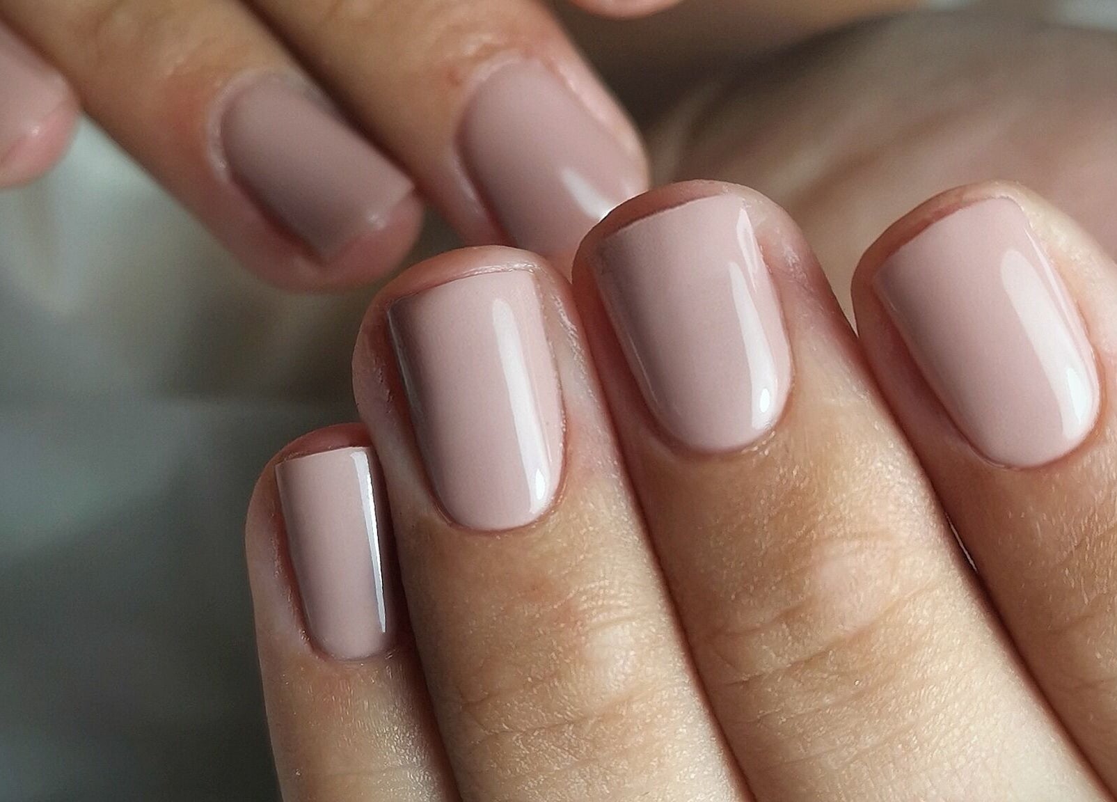 Elegant nude manicure by Kerry Wright Nail Artist in Rotherham, England, GB, showcasing smooth, glossy finish.