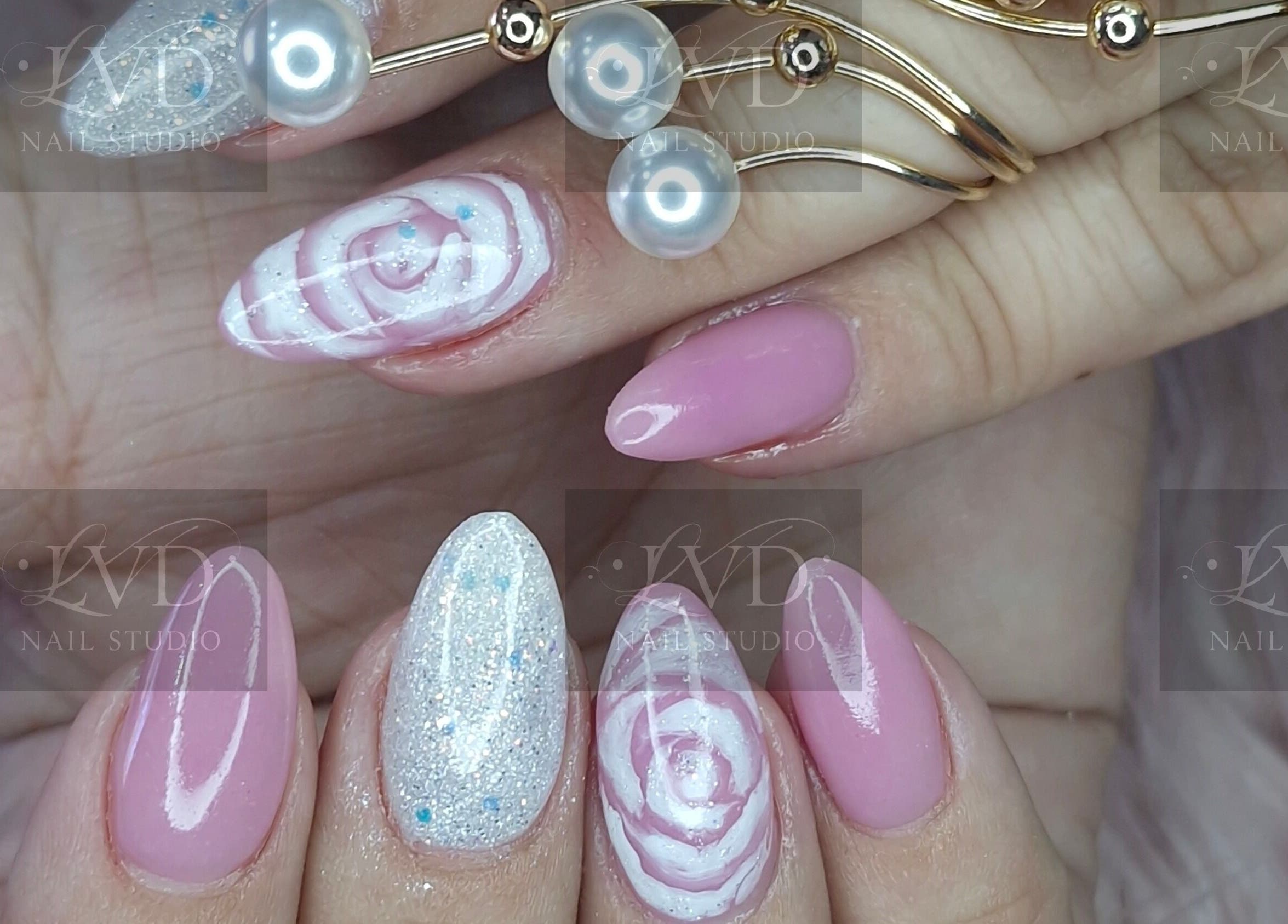 Chic floral and glitter nail art at LVD NAIL STUDIO, Pretoria, Gauteng, ZA. Perfect for a stylish look.