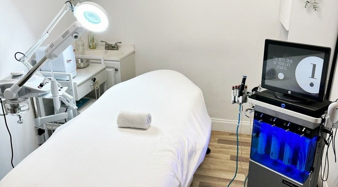 Relaxing treatment room at Everybody is Beautiful Med Spa, Boca Raton, Florida, US with modern skincare equipment.