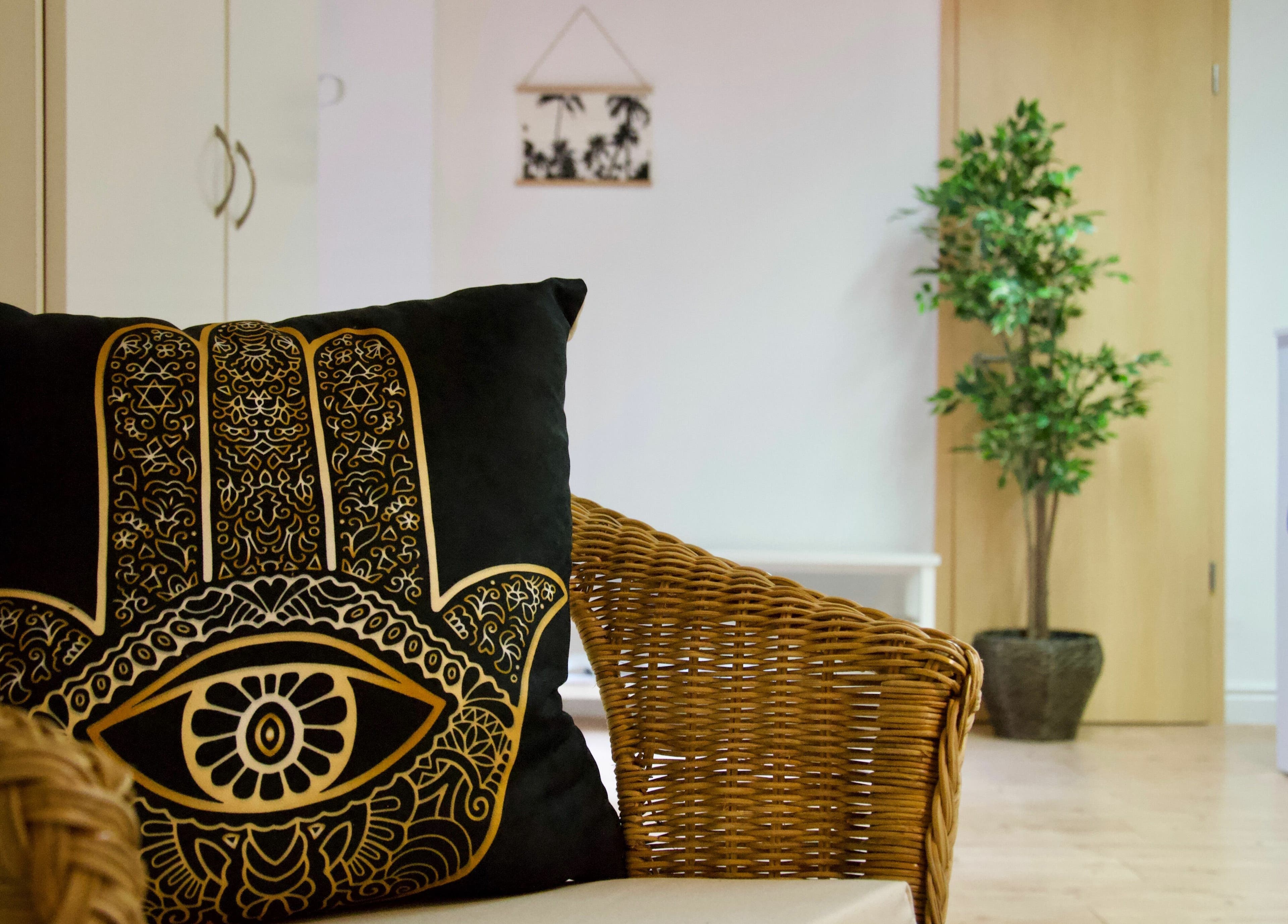 Cozy seating area at Thai 5 Budapest Thai Massage, Budapest, Magyar, HU, featuring a stylish decorative pillow.