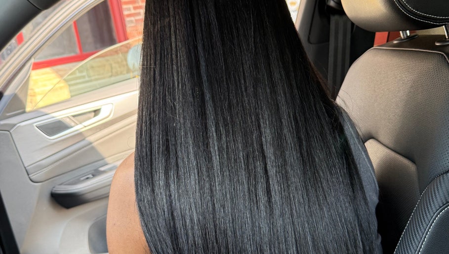 Sleek black hair inside a car at 3570 Warrensville Center Rd, Shaker Heights OH 44122, Ohio, US.