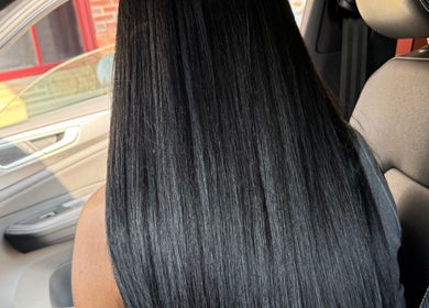 Sleek black hair inside a car at 3570 Warrensville Center Rd, Shaker Heights OH 44122, Ohio, US.