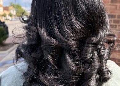 Close-up of shiny, curled hair at 3570 Warrensville Center Rd Shaker Heights OH 44122, Ohio, US.