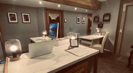 Calm workspace at IVY Spa and Beauté, Saint Jean D’Aulps, Auvergne-Rhône-Alpes, FR. Elegant reception desk and decor.