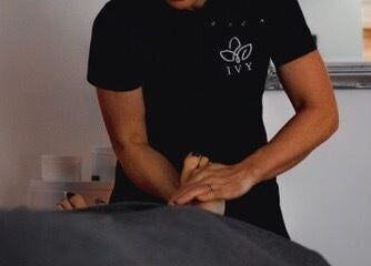 Therapist at IVY Spa and Beauté in Saint Jean D’Aulps, Auvergne-Rhône-Alpes giving a foot massage.