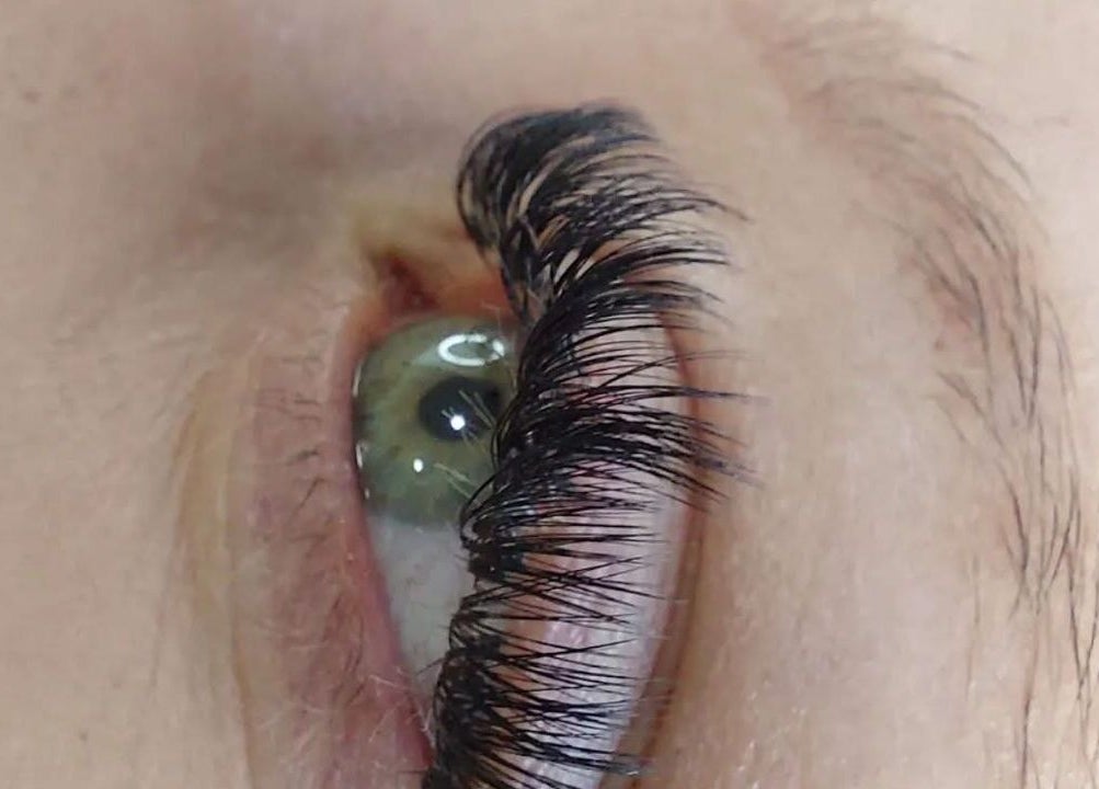 Close-up of eye with elegant eyelash extensions at Design on a Dime, Benoni, Gauteng, ZA.