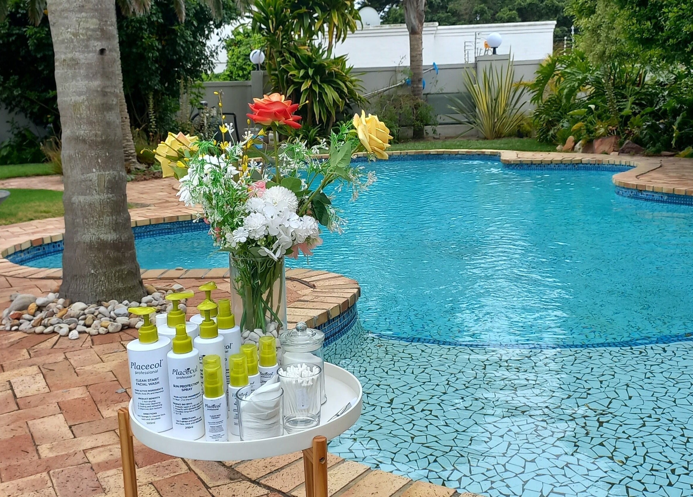 Mello's Mobile Beauty Spa setup by the pool in Gqeberha, Eastern Cape, ZA for a relaxing beauty treatment.