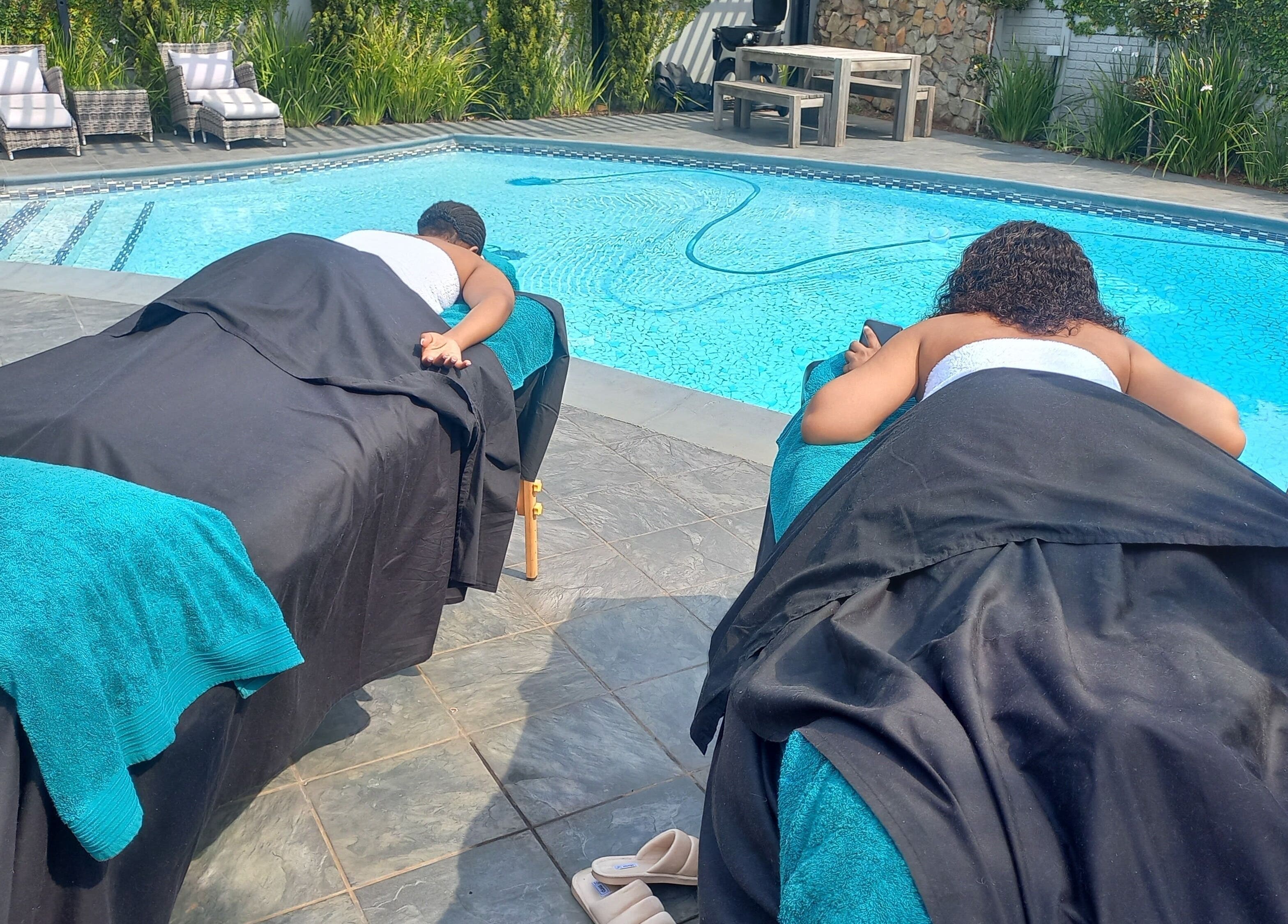 Relax by the pool with massages at Mello's Mobile Beauty Spa in Gqeberha, Eastern Cape, ZA.