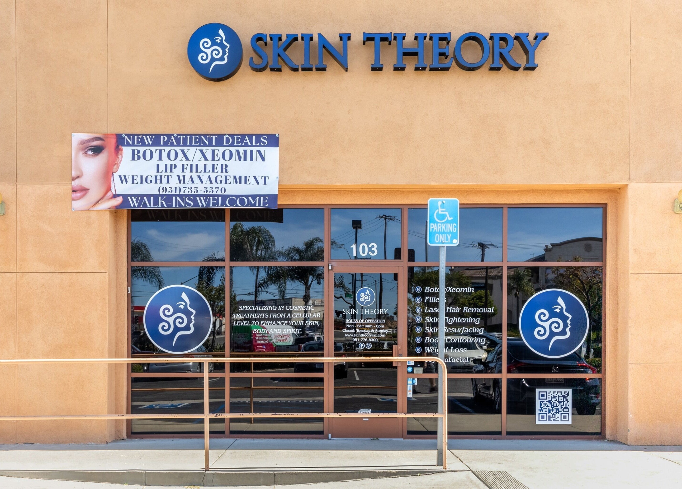 Exterior of Just Be Skin Day Spa in Riverside, California, US showing entrance and signage.