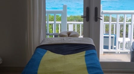 Serene massage room at Lotus Relaxation Oasis 242, Nassau, New Providence, BS with ocean view.