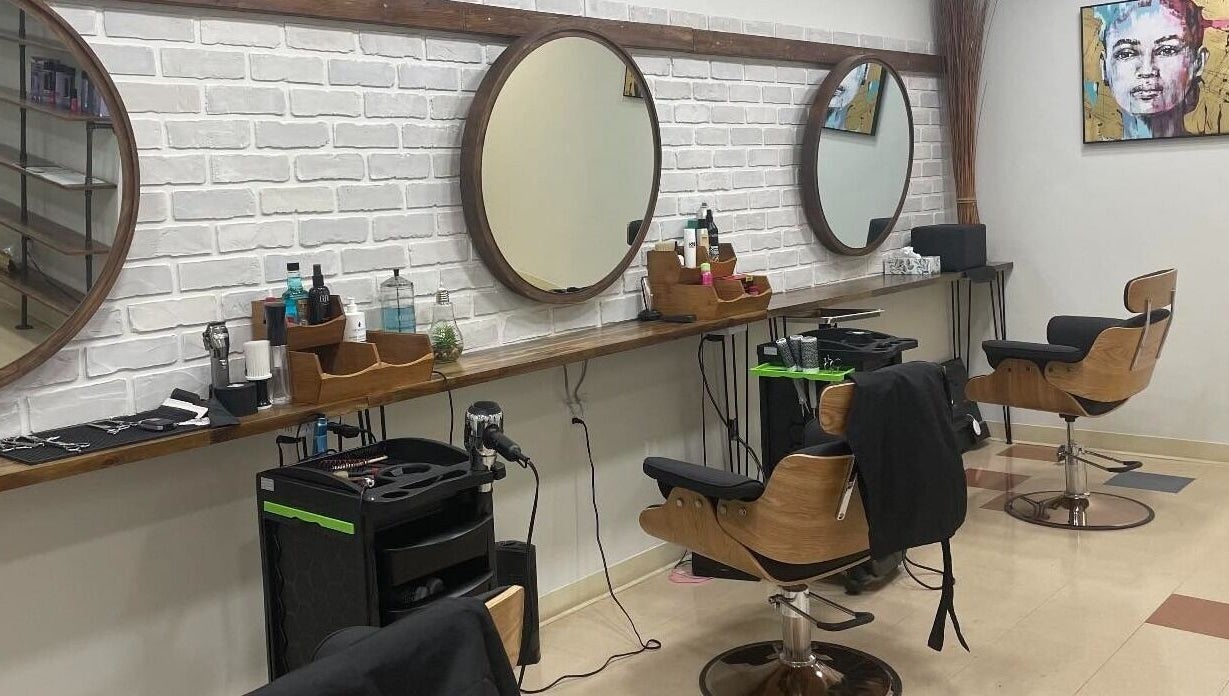 Modern salon chairs and mirrors at Krystel MediSpa & Salon in Dieppe, New Brunswick, CA.