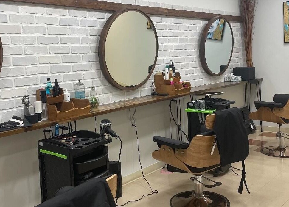 Modern salon chairs and mirrors at Krystel MediSpa & Salon in Dieppe, New Brunswick, CA.