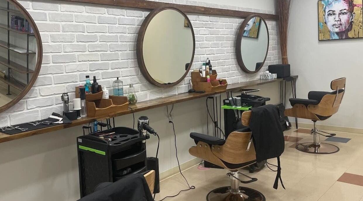 Modern salon chairs and mirrors at Krystel MediSpa & Salon in Dieppe, New Brunswick, CA.