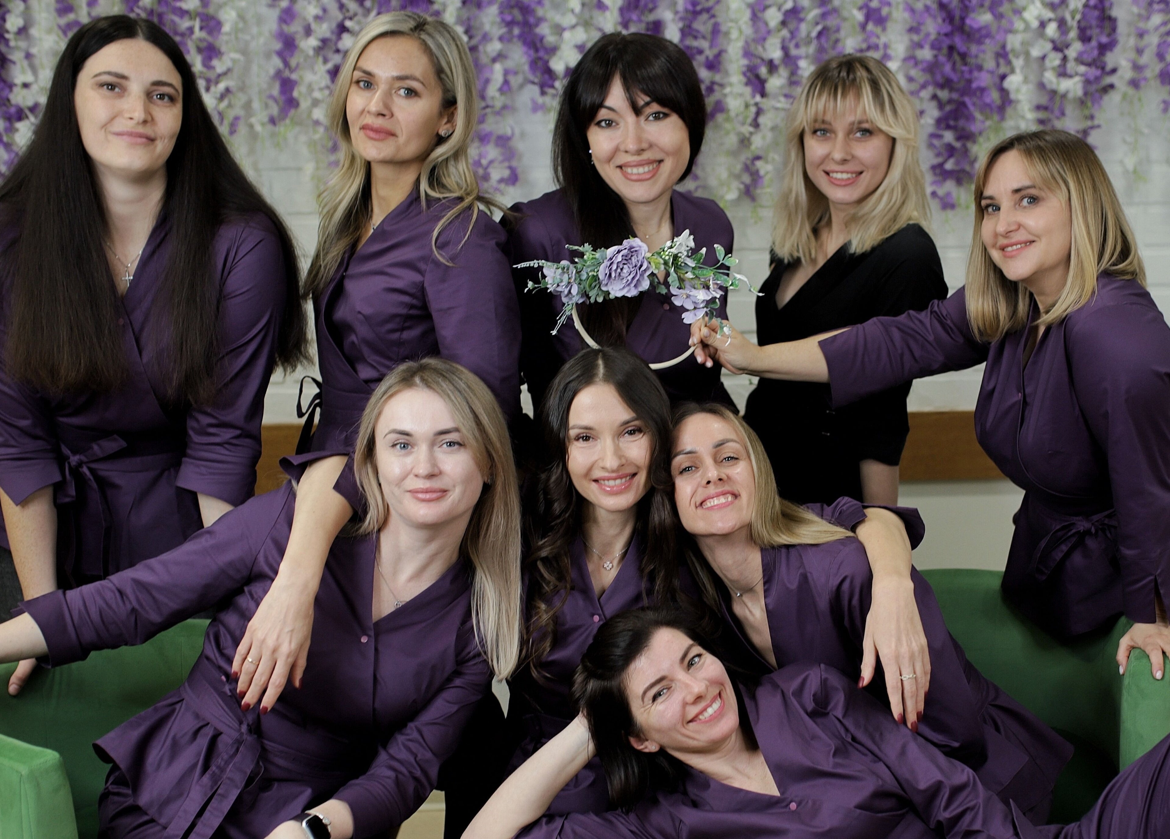 Team of professional staff at Krystel MediSpa & Salon, Dieppe, New Brunswick, CA, in vibrant uniforms.