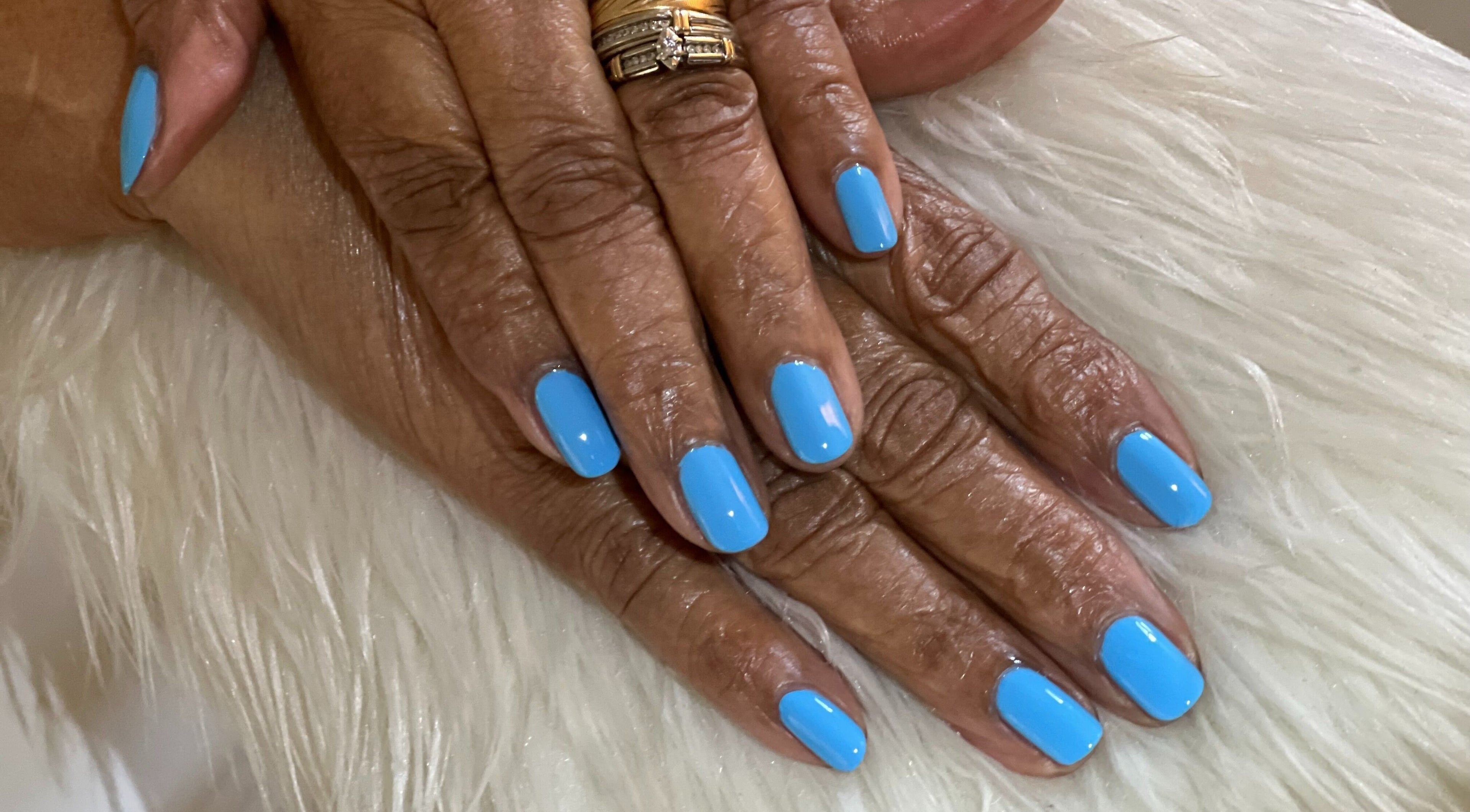Elegant blue manicure at Nail Anatomy - Mobile in Stockbridge, Georgia, US.
