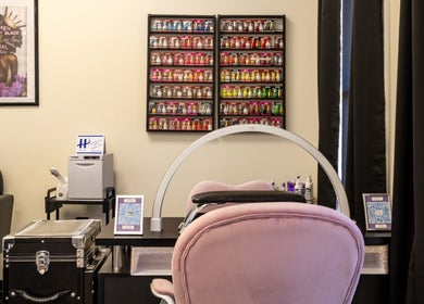 Elegant nail station at Nail Anatomy - Morrow, Morrow, Georgia, US with vibrant polish display.