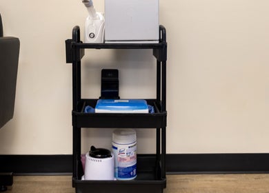 Organized nail care cart at Nail Anatomy - Morrow, Georgia, US, featuring essential tools and products.