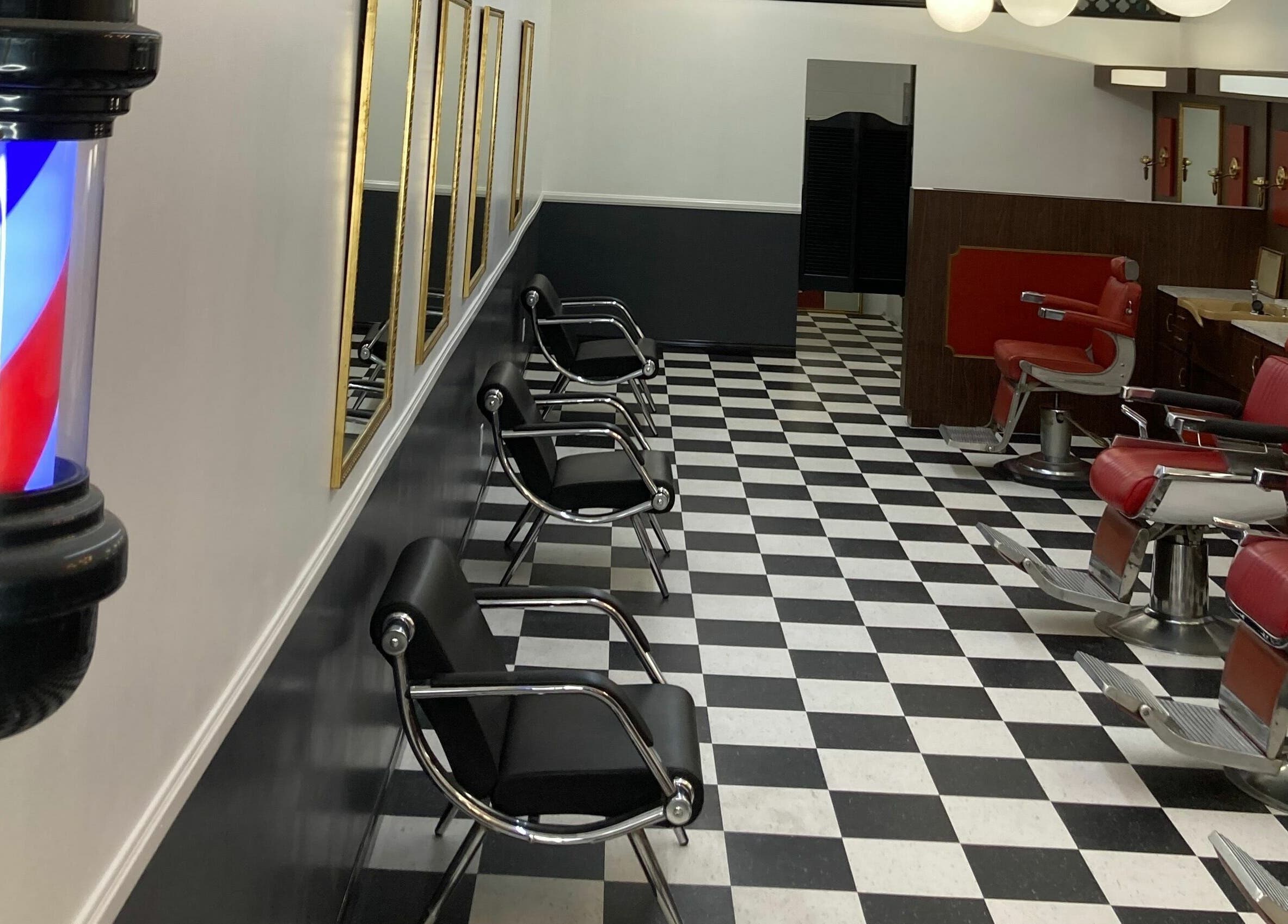 Classic barbershop chairs and decor at The Checkmate Barbershop in Montebello, California, US.
