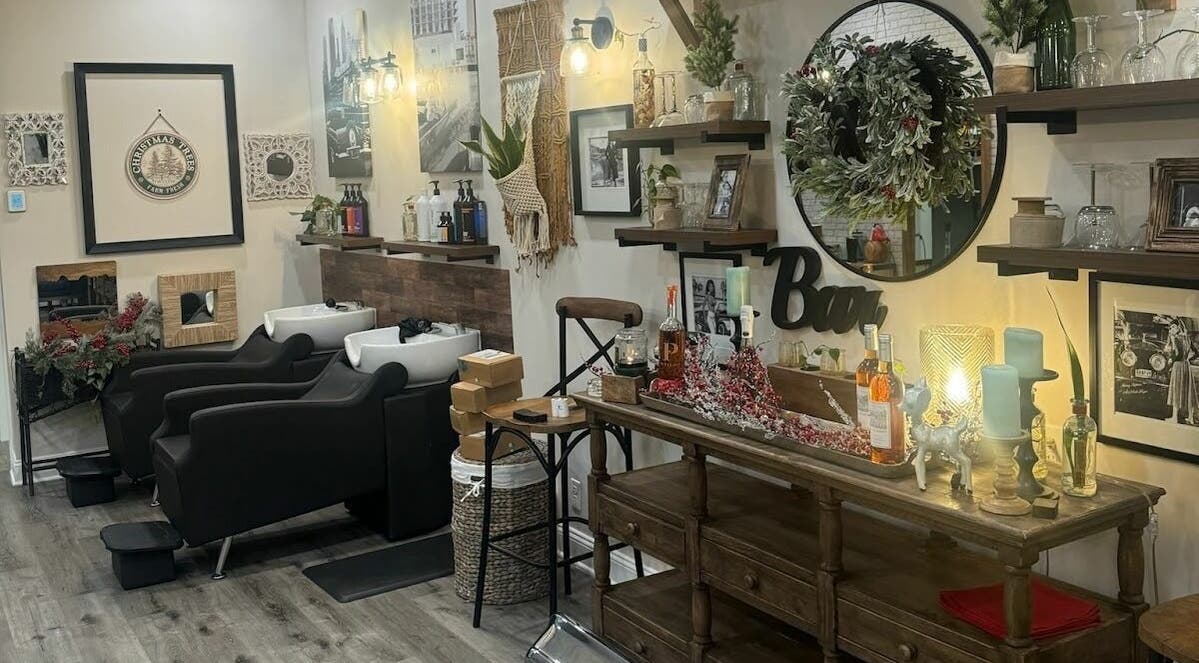 Chic interior of Slek Hair Studio in Florham Park, New Jersey, US, showcasing elegant decor and styling stations.