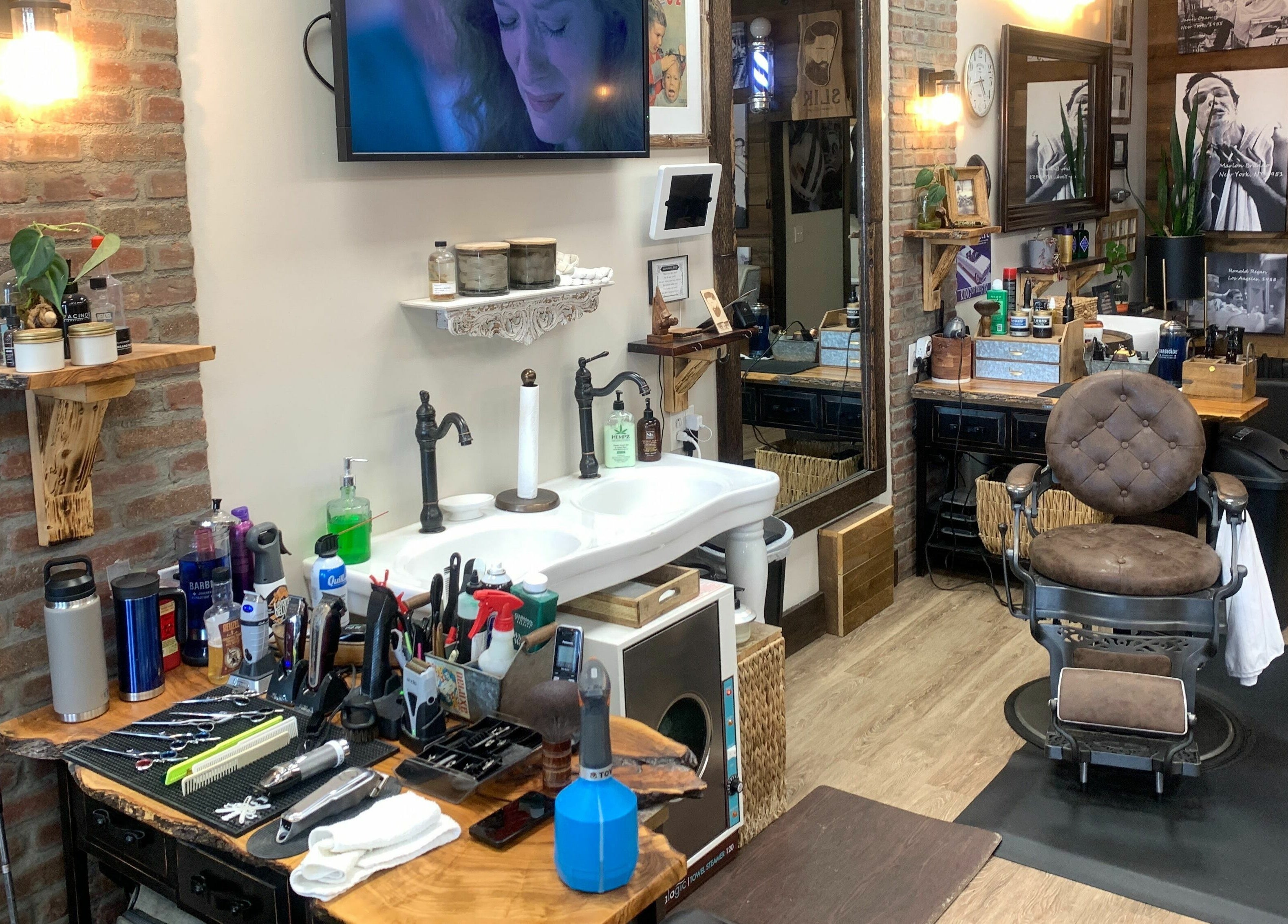 Interior of Slek Hair Studio in Florham Park, New Jersey, showcasing a vintage barbershop chair and styling tools.