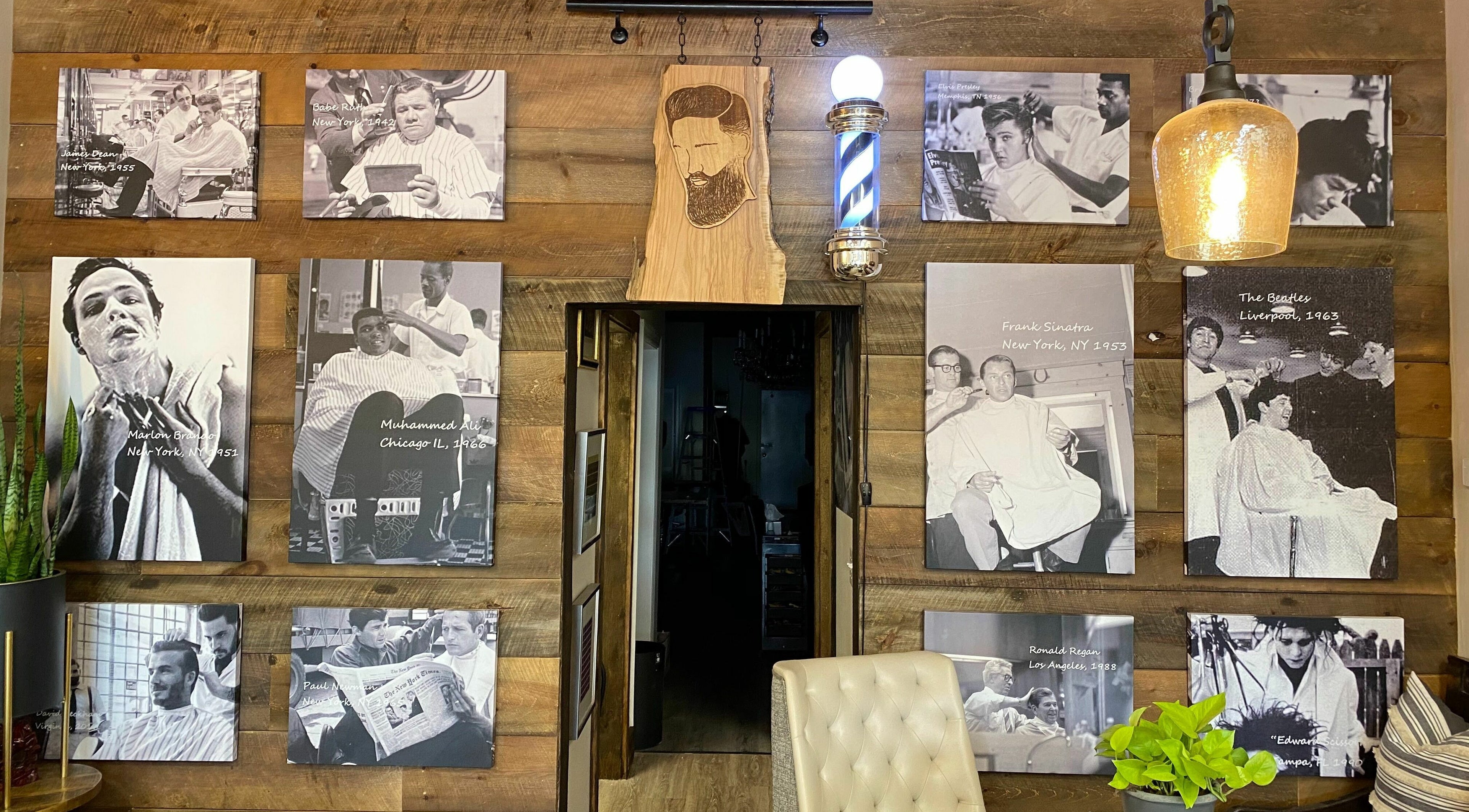 Wall of classic celebrity photos at Slek Hair Studio, Florham Park, New Jersey, US, showcasing vintage style.