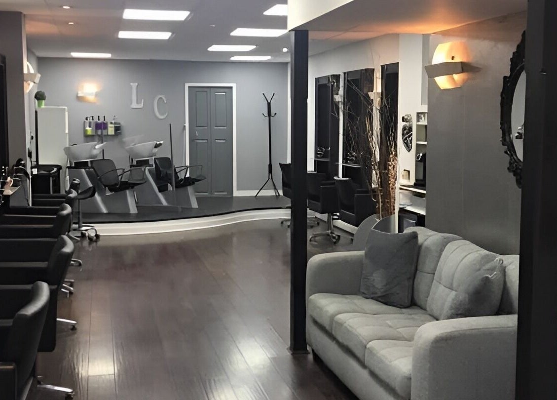 Sophisticated salon layout at Laura Caroline Hairdressing, Cheadle Hulme, England, GB with modern styling stations.