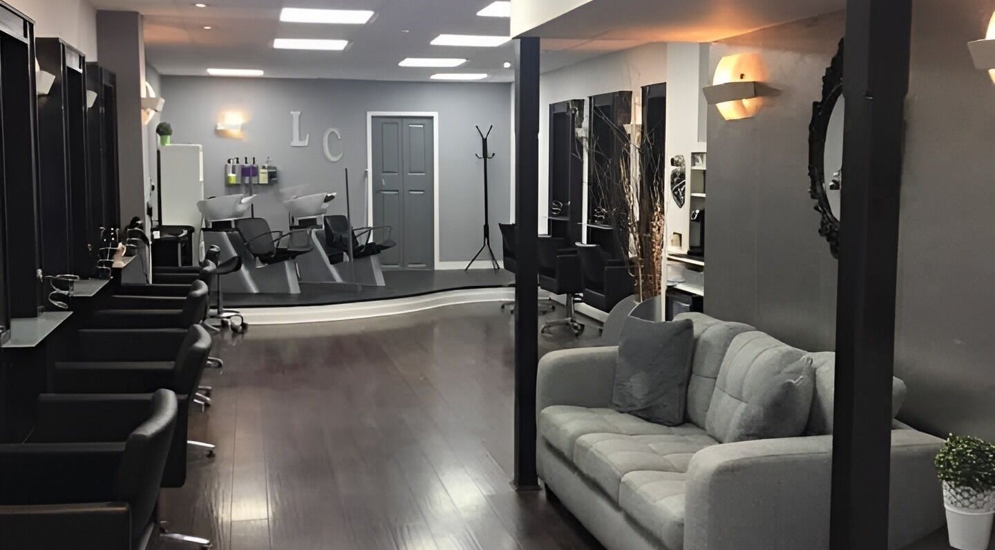 Sophisticated salon layout at Laura Caroline Hairdressing, Cheadle Hulme, England, GB with modern styling stations.