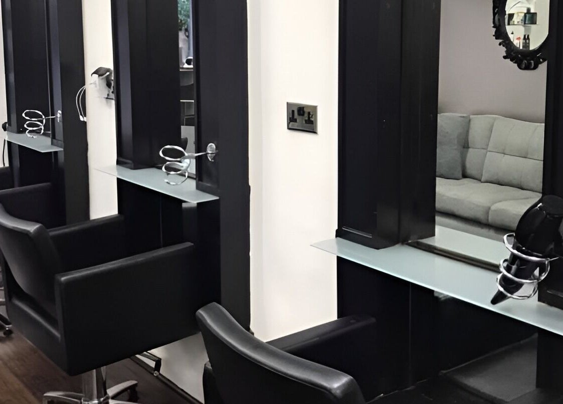 Modern hairdressing stations at Laura Caroline Hairdressing, Cheadle Hulme, England, GB.