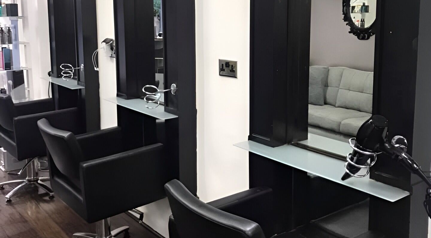 Modern hairdressing stations at Laura Caroline Hairdressing, Cheadle Hulme, England, GB.